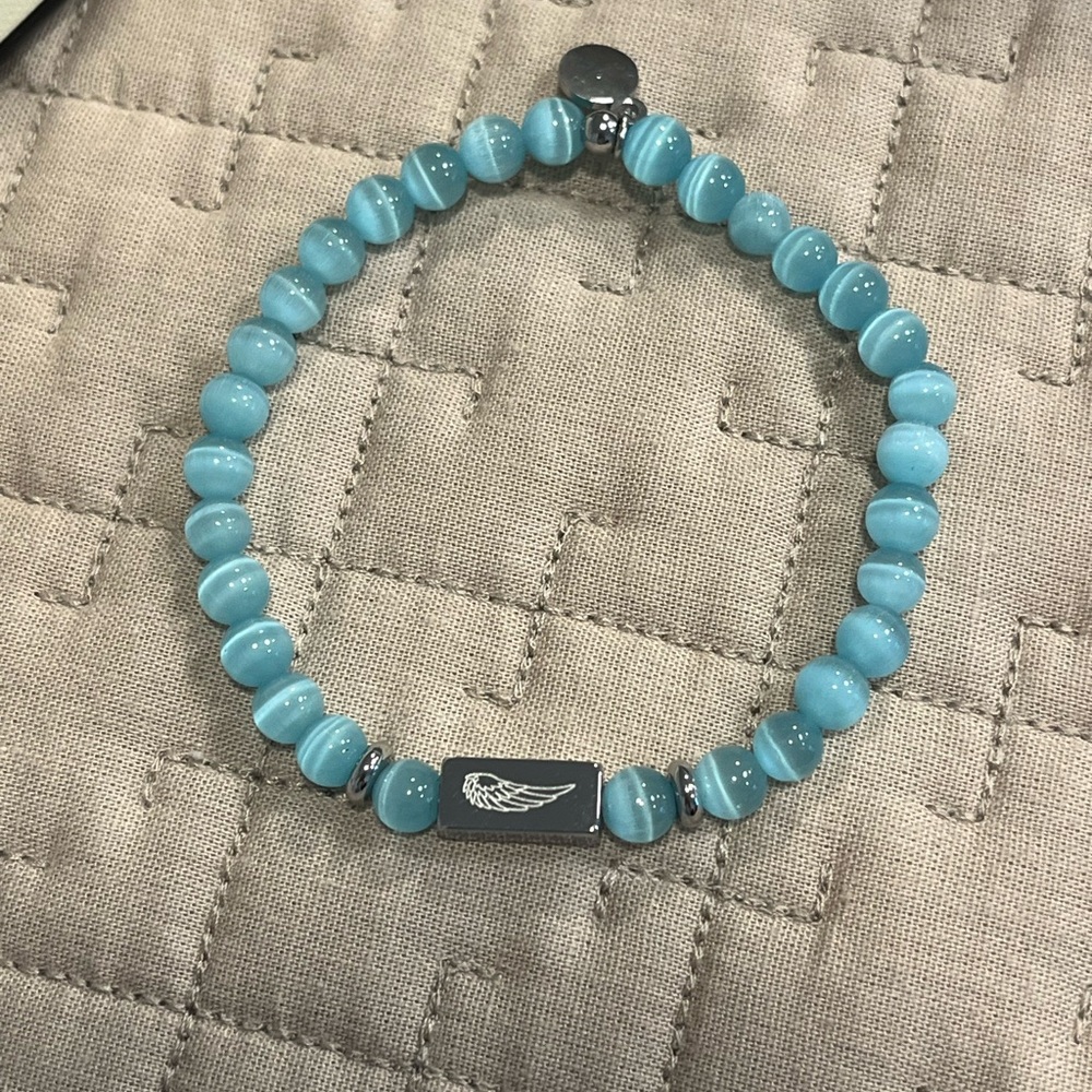 Blue Beaded Bracelet with Wing Charm